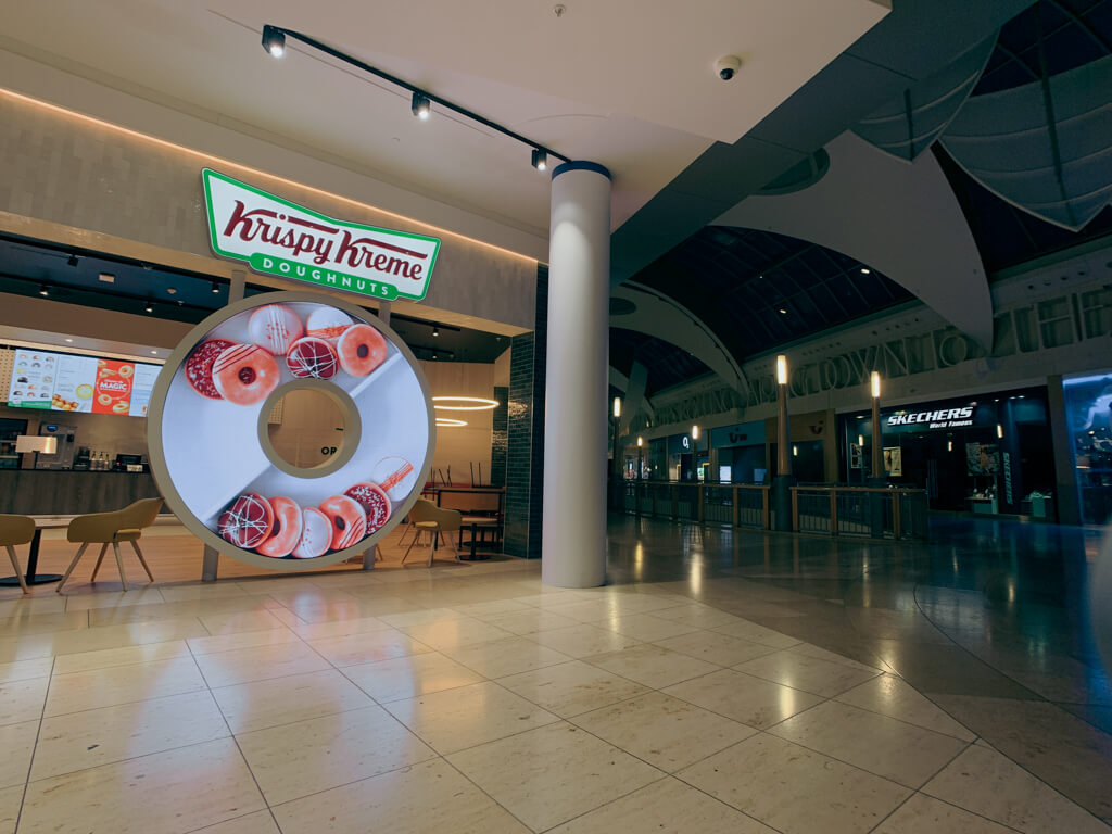 eclipse digital media digital signage av led - custom led donut screen krispy kreme bluewater